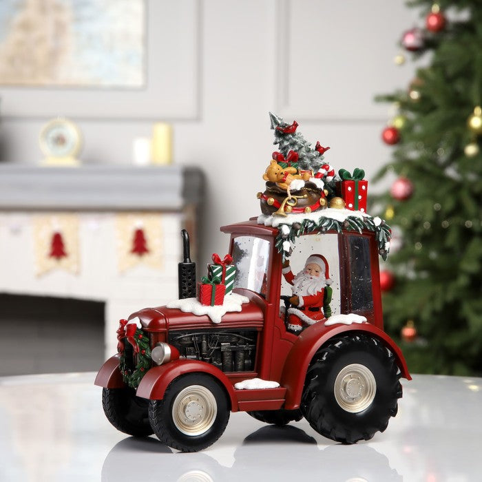Decoratiune Craciun tip Tractor cu Mos Craciun, brad si cadouri, functie muzicala, zapada in miscare, 25 × 13 × 21 cm