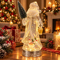 Decorațiune Premium Moș Crăciun Luminos cu Brad, Felinar și Efect Strălucitor – 30 cm