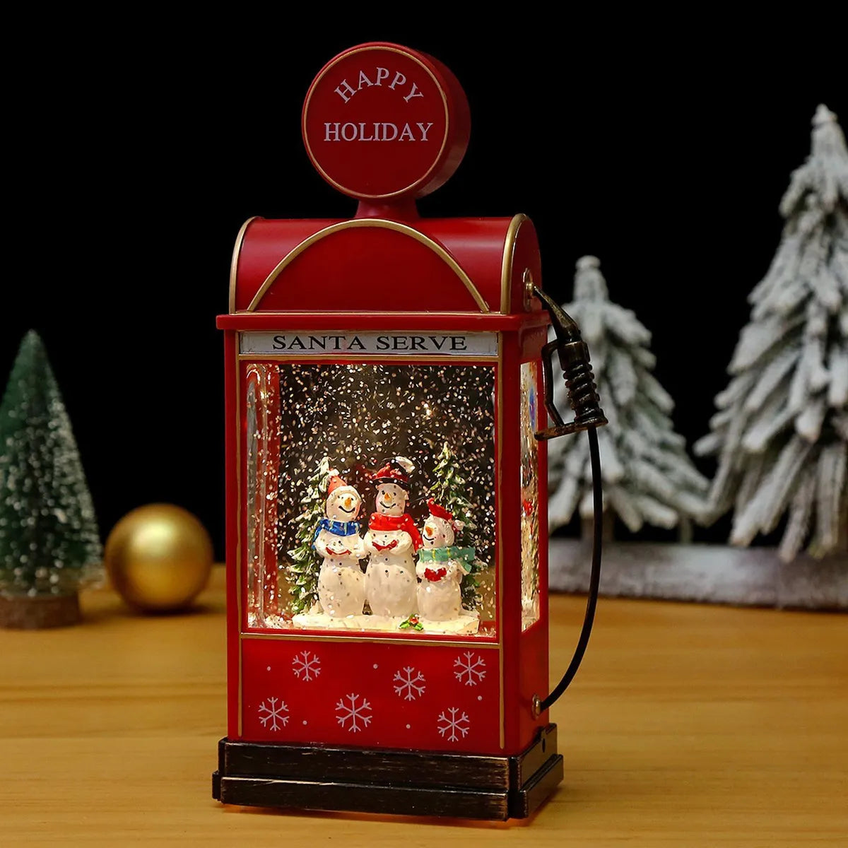 Glob de zapada muzical in forma de statie de benzina – cu lumini, efect de ninsoare si 8 melodii de Craciun