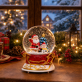 Glob de Zăpadă Premium de Crăciun cu Moș Crăciun, Bază tip Sanie, Muzică, Lumină LED și Efect de Ninsoare – 15 × 10 cm