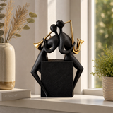 Statuetă Decorativă Premium „Cuplu de Muzicieni”, cu Trompetă și Saxofon, Negru-Auriu, din Rășină – 20,8 × 9 × 21,5 cm - in context de utilizare