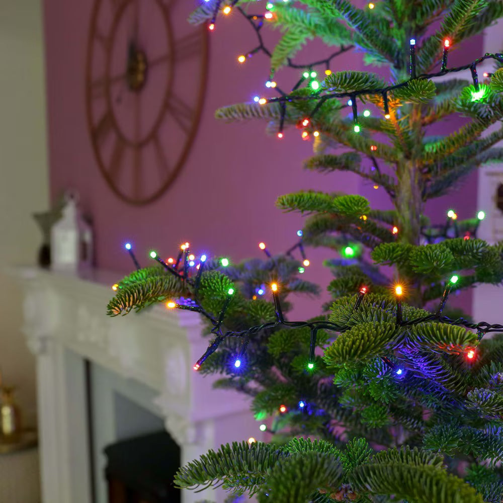 Instalatie de craciun muzicala, fir verde, tip sir, 100 led, lungime 10m, interior/exterior, interconectabila, alimentare la priza, multicolor