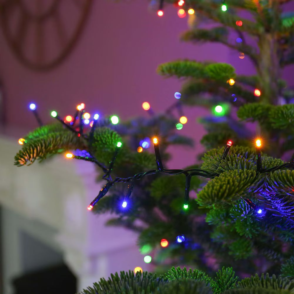 Instalatie de craciun muzicala, fir verde, tip sir, 100 led, lungime 10m, interior/exterior, interconectabila, alimentare la priza, multicolor